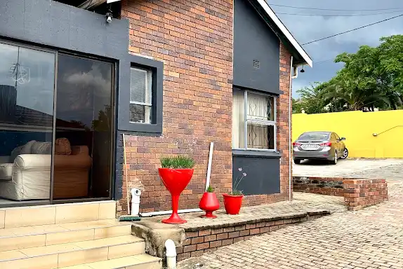 Cosy face-brick home with a Soweto family